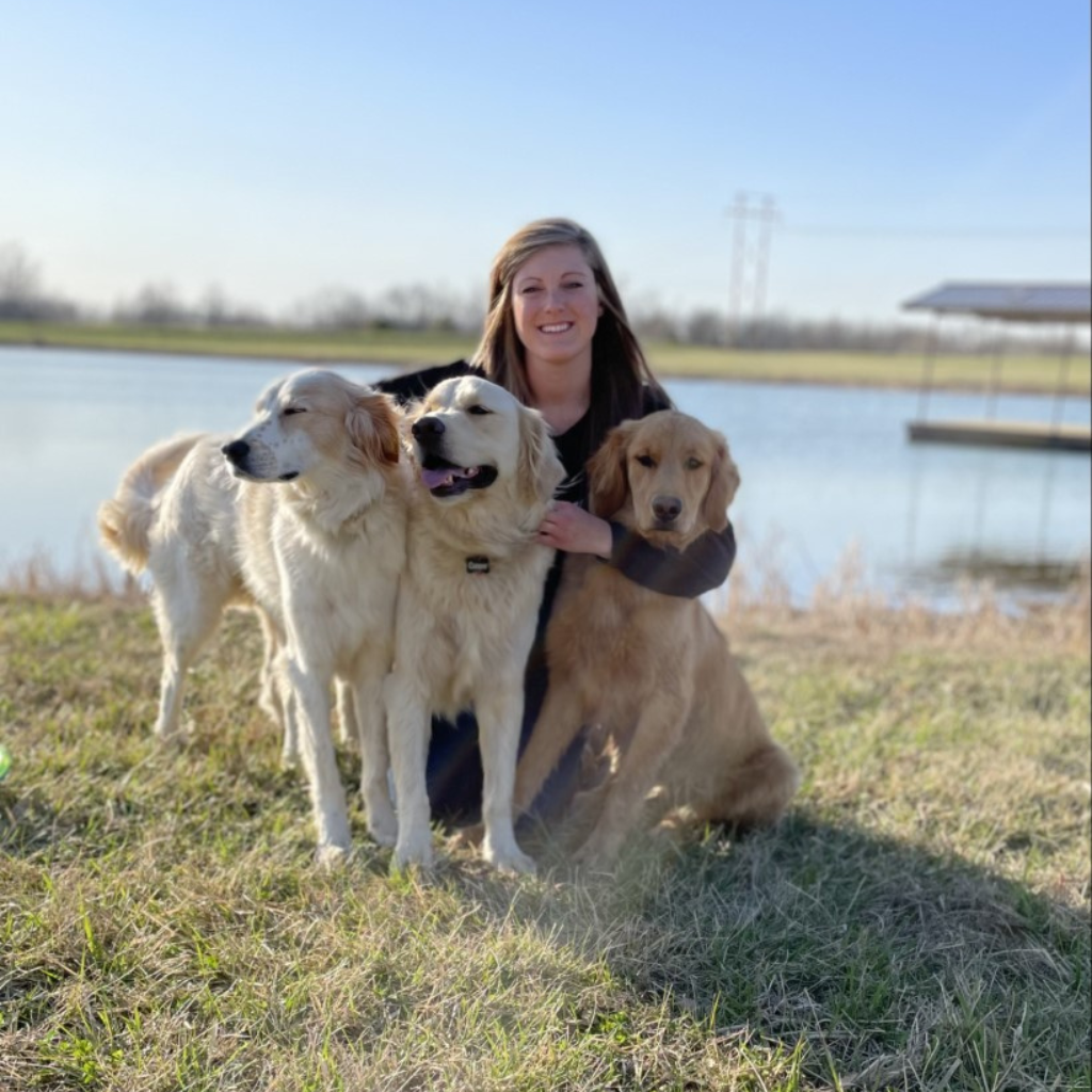 Katie, DVM with 3 dogs